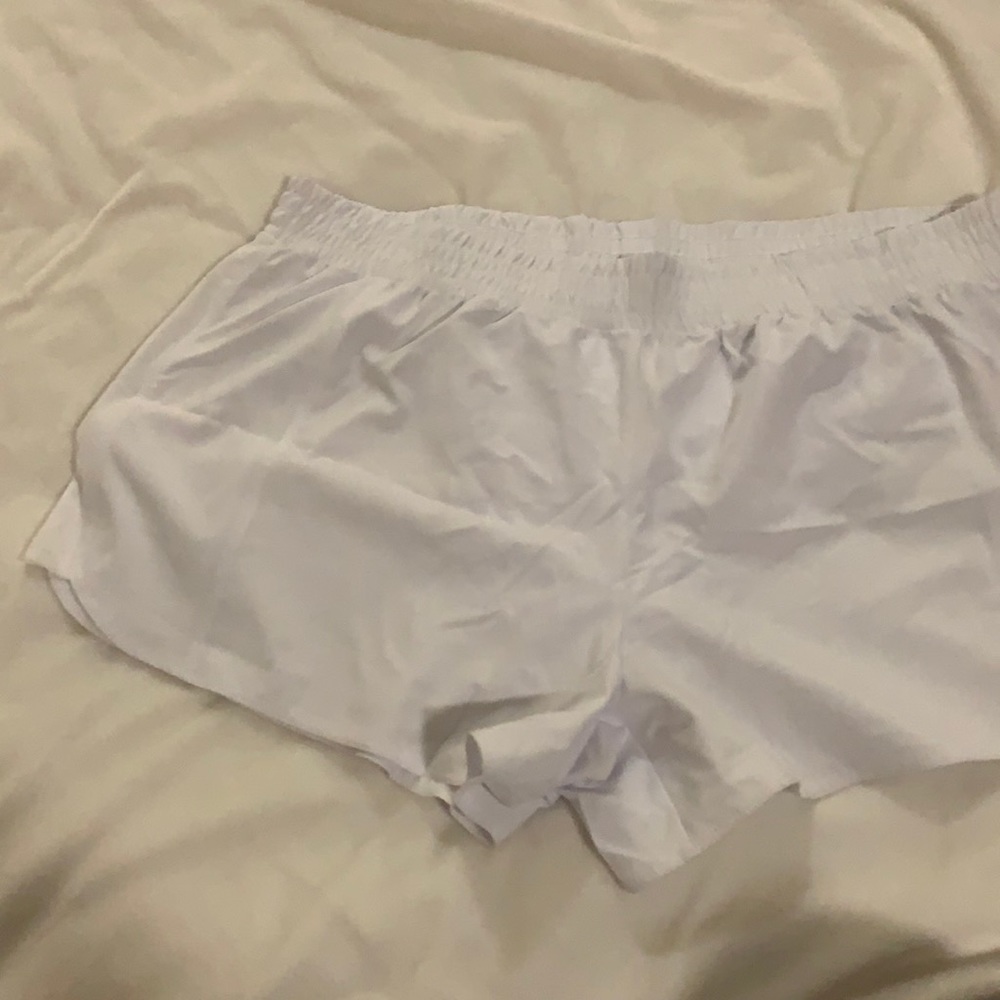 5/$25 Reebok women’s white running shorts size XL NWT